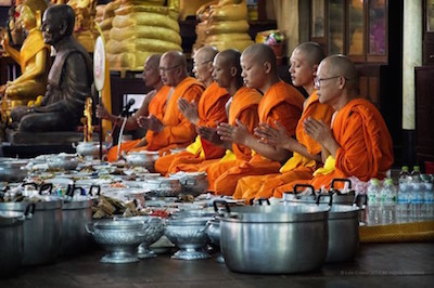 monks eating mindfully
